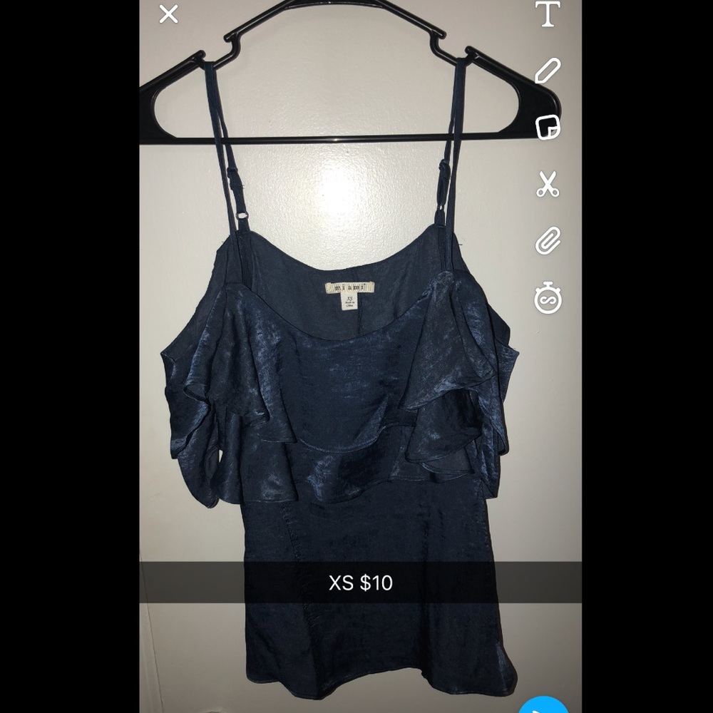 Shiny metallic looking shirt, off the shoulder